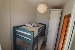 A bed or beds in a room at Casa Vacanza Benny Otranto