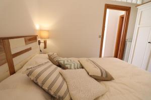 A bed or beds in a room at Casa Vacanza Benny Otranto