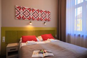 Łóżko lub łóżka w pokoju w obiekcie Hotel *** NAT Krynica Zdrój