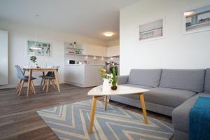 Kuchyň nebo kuchyňský kout v ubytování Duenenpark-Heiligenhafen-Haus-Duenengras-Wohnung-Duenentraum-Nr-2