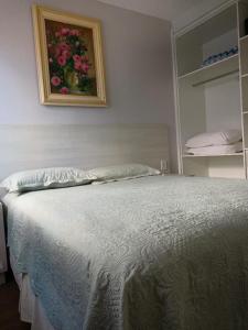 Postel nebo postele na pokoji v ubytování House Flat Cacupé em Florianópolis