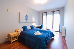 Tempat tidur dalam kamar di Apartament Karmelowy z tarasem - Dream Apart