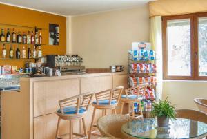 Nápoje v ubytování Hotel Orion