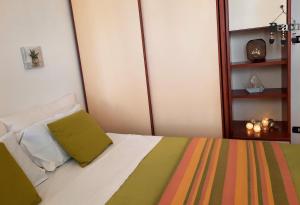 A bed or beds in a room at Casa Alice