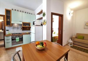 A kitchen or kitchenette at Casa Alice