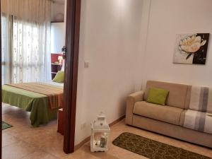 A bed or beds in a room at Casa Alice