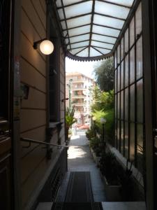 a view from inside a building of a building at Hotel Liberty in Sanremo