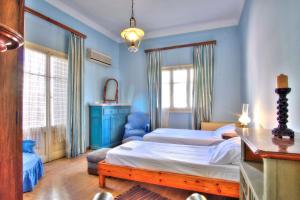 Posteľ alebo postele v izbe v ubytovaní Casa Victorina Old Town