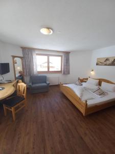 Postel nebo postele na pokoji v ubytování Hotel Casada - inklusive Sommer Card