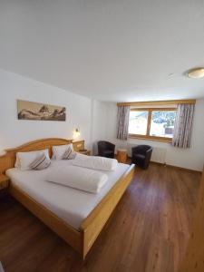 Postel nebo postele na pokoji v ubytování Hotel Casada - inklusive Sommer Card