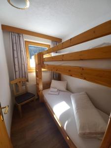 Postel nebo postele na pokoji v ubytování Hotel Casada - inklusive Sommer Card