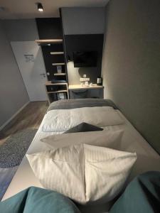 Voodi või voodid majutusasutuse Hotel Falkenturm toas