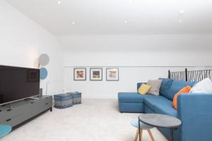 Et tv og/eller underholdning på Edinburgh Deluxe Duplex with Garage