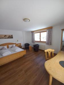 Postel nebo postele na pokoji v ubytování Hotel Casada - inklusive Sommer Card + 37 fotografií