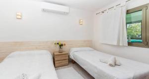 A bed or beds in a room at Francisca Még 15 kép