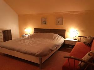 Postel nebo postele na pokoji v ubytování Haus Romsicht Karinthië