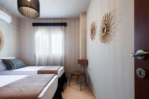 Postel nebo postele na pokoji v ubytování Villa Nero + 35 fotografií