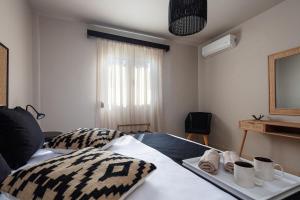 Postel nebo postele na pokoji v ubytování Villa Nero
