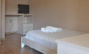 Postel nebo postele na pokoji v ubytování Hotel Rural Val Dos Pigarros
