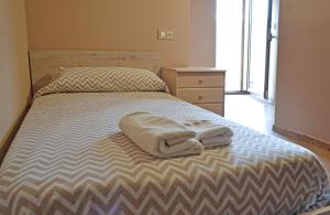 Postel nebo postele na pokoji v ubytování Hotel Rural Val Dos Pigarros