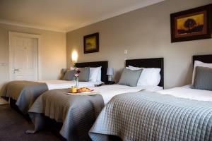 Letto o letti in una camera di The Harbour Inn