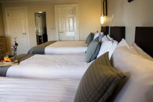 Letto o letti in una camera di The Harbour Inn