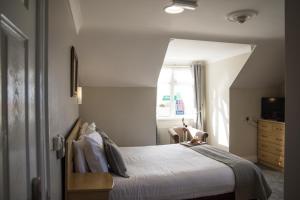 Letto o letti in una camera di The Harbour Inn