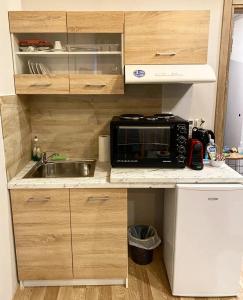 Kuchyňa alebo kuchynka v ubytovaní Agora Boutique Apartments Ioannina