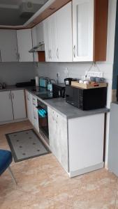 Kuchyňa alebo kuchynka v ubytovaní Apartament na nowej starówce