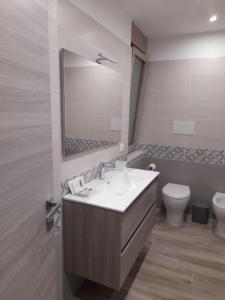 Koupelna v ubytování Tripepi suites