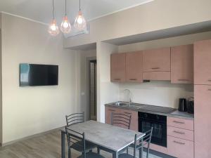 Kuchyň nebo kuchyňský kout v ubytování Tripepi suites + 10 fotografií