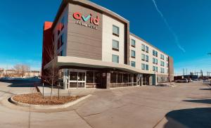 a building with a sign on the front of it at avid hotels - Sioux City - Downtown, an IHG Hotel in Sioux City