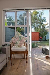 Posezení v ubytování Aloe Aloe Cottage