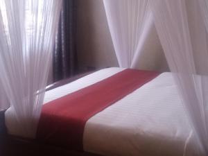 Cama o camas de una habitación en Mlex Hotel