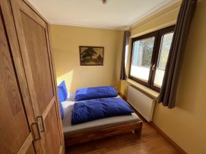 Postel nebo postele na pokoji v ubytování Ferienanlage Bullerbü