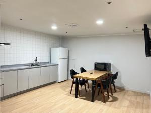 Kuchyň nebo kuchyňský kout v ubytování Hotel International Changwon