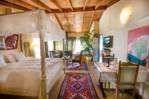 Postel nebo postele na pokoji v ubytování Ha'Seuda Ha'Achrona Suites + 37 fotografií