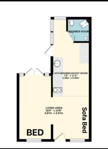 a floor plan of a bedroom with a bed at The Salty Bee in South Hayling