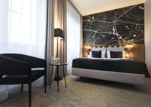 Postel nebo postele na pokoji v ubytování Best Western Hotel Mariacki Katowice + 37 fotografií