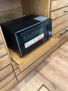 a toaster oven sitting on top of a drawer at KAI Ichinomiya in Ichinomiya