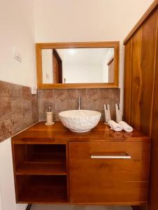 A bathroom at Surfers Villa and Resorts Medewi