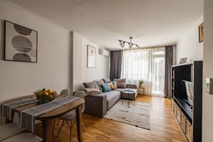 TV a/nebo společenská místnost v ubytování Matisse Hotflat