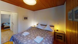 Ein Bett oder Betten in einem Zimmer der Unterkunft Ferienhaus Siesta Hahnenklee mit großem Grundstück