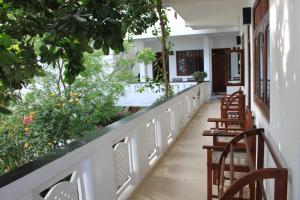 Balkón nebo terasa v ubytování Unawatuna Beach Bungalow -