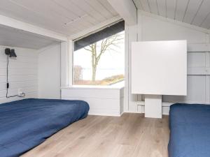 Postel nebo postele na pokoji v ubytování Holiday home Aabenraa LV