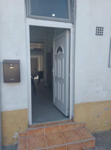 a hallway with a door in a building at Linh Phuong in Budapest