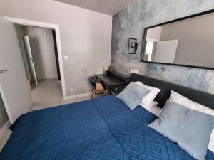 Posteľ alebo postele v izbe v ubytovaní M&K Apartament Bałtyk - Sobieszewo - Wyspa Sobieszewska
