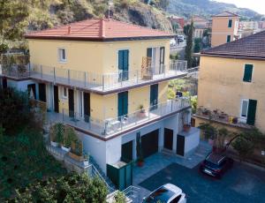 an aerial view of a large house with a balcony at Affittacamere L'Orto dei nonni in Levanto