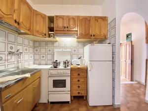 Dapur atau dapur kecil di Holidaycasa Isabel - In pieno centro storico +14 gambar