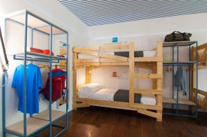 Postel nebo postele na pokoji v ubytování Gabanel Bike Hostel